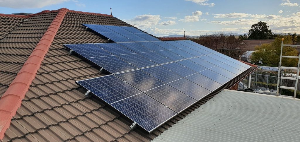 Solar panels installed by Sun Connect Solar on a terracotta tiled roof