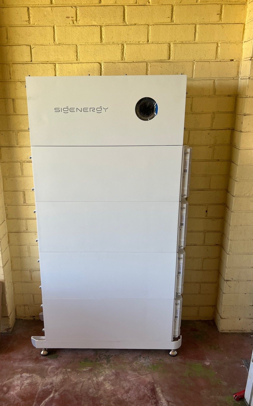 Sigenergy SigenStor battery with four battery modules Sigenergy SigenStor battery with four battery modules, about 32 kWh, on a covered brick patio in Alstonville, installed by Sun Connect Solar