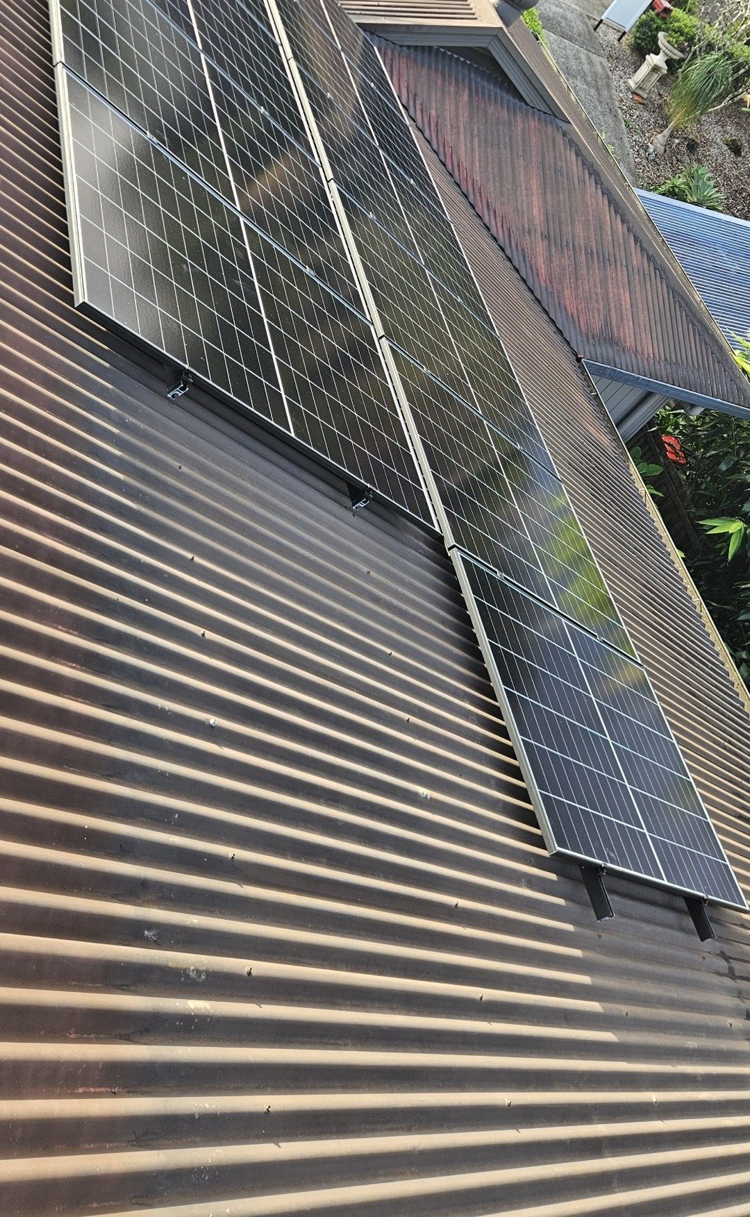 AIKO solar panels on a corrugated roof in Bangalow, part of a 10.45 kW solar and 24 kWh Sigenergy battery install by Sun Connect Solar
