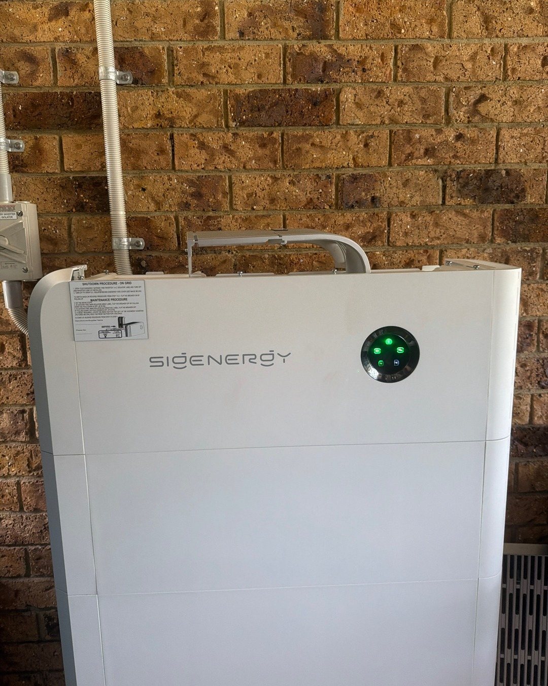 Sigenergy SigenStor 32 kWh battery with four battery modules against a brick wall under cover in East Ballina Sigenergy SigenStor 32 kWh battery with four battery modules against a brick wall under cover in East Ballina, installed by Sun Connect Solar