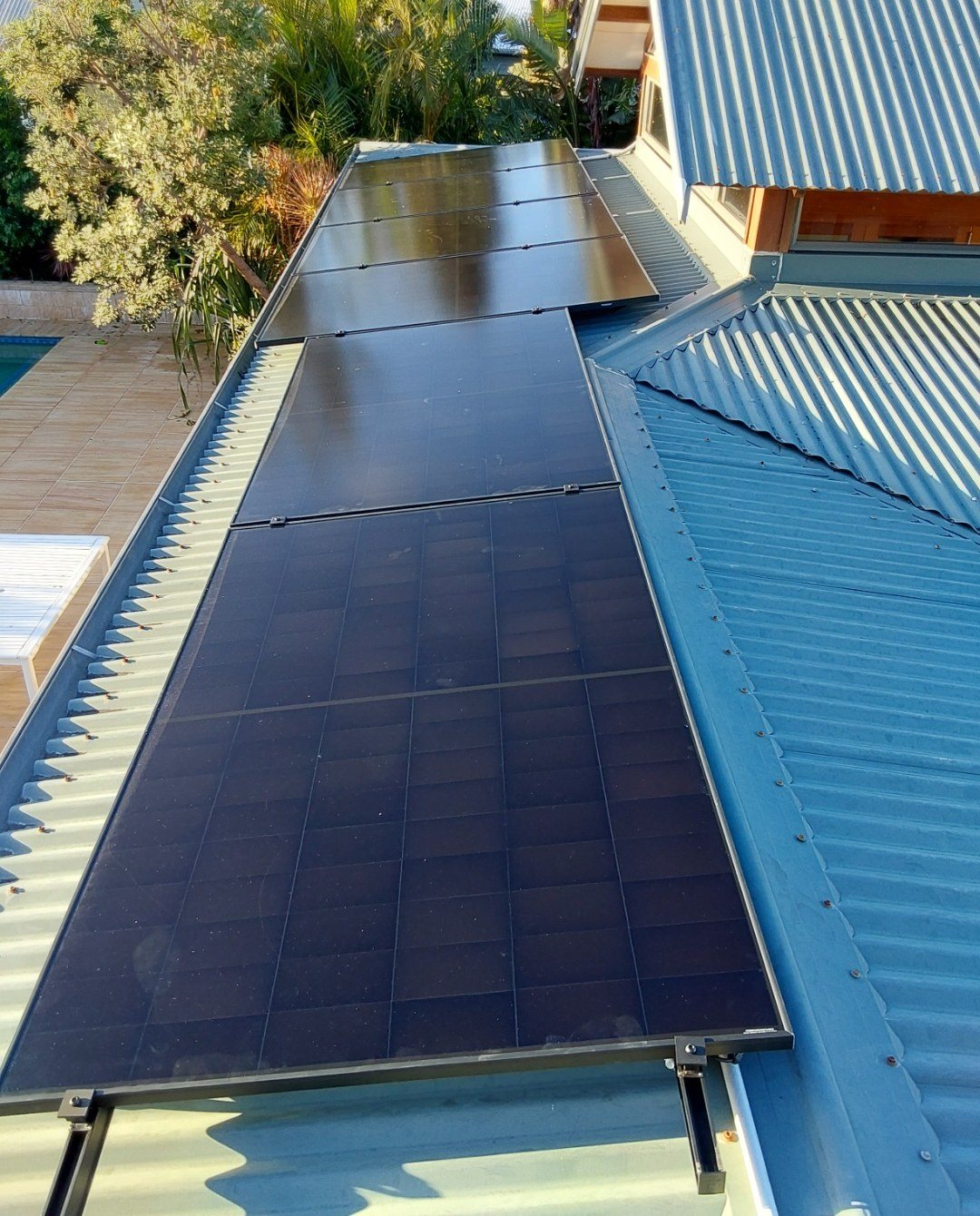 All-black AIKO solar panels on a Colorbond roof at a Pottsville home on the Tweed Coast All-black AIKO solar panels on a Colorbond roof at a Pottsville home on the Tweed Coast, installed by Sun Connect Solar