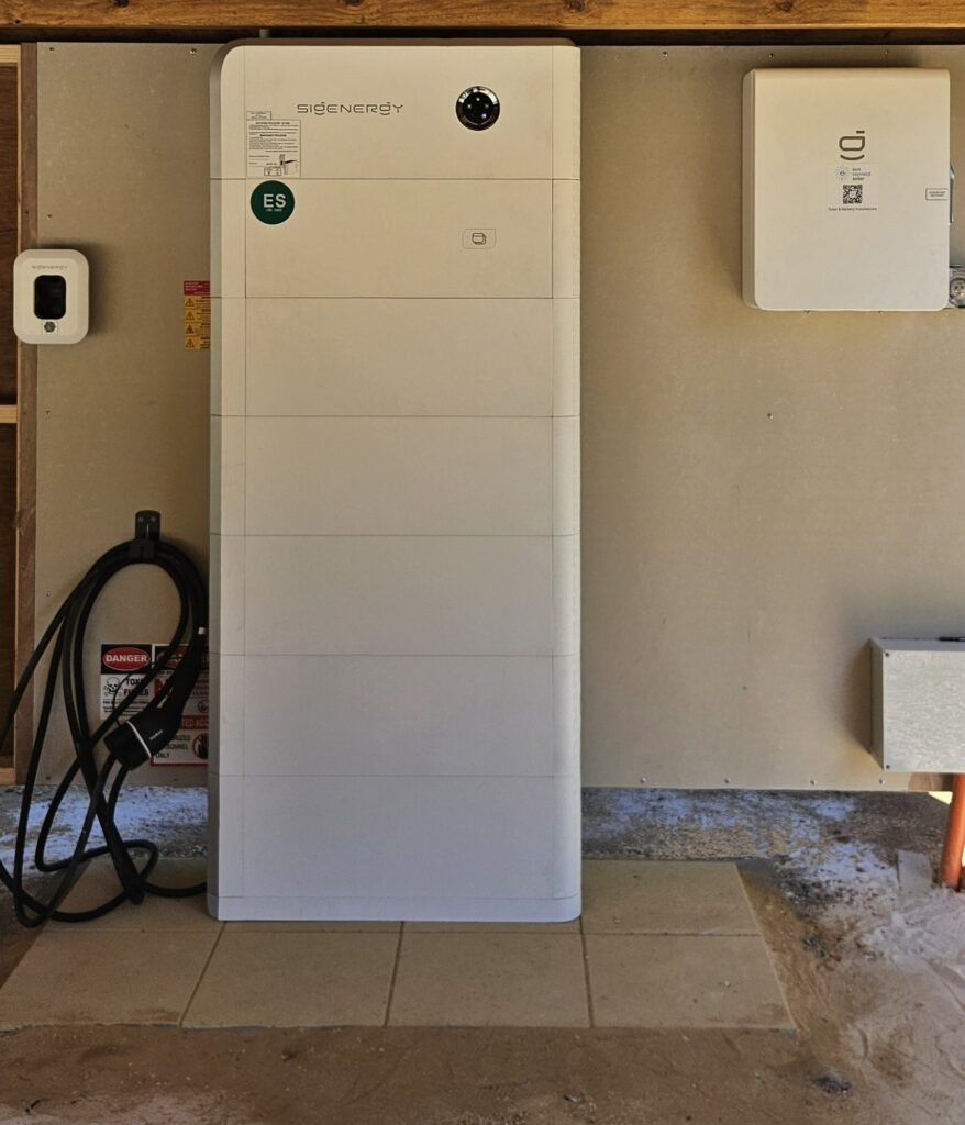 Sigenergy battery stack with a Sigenergy DC EV charger cable and Gateway on a Huonbrook home, installed by Sun Connect Solar