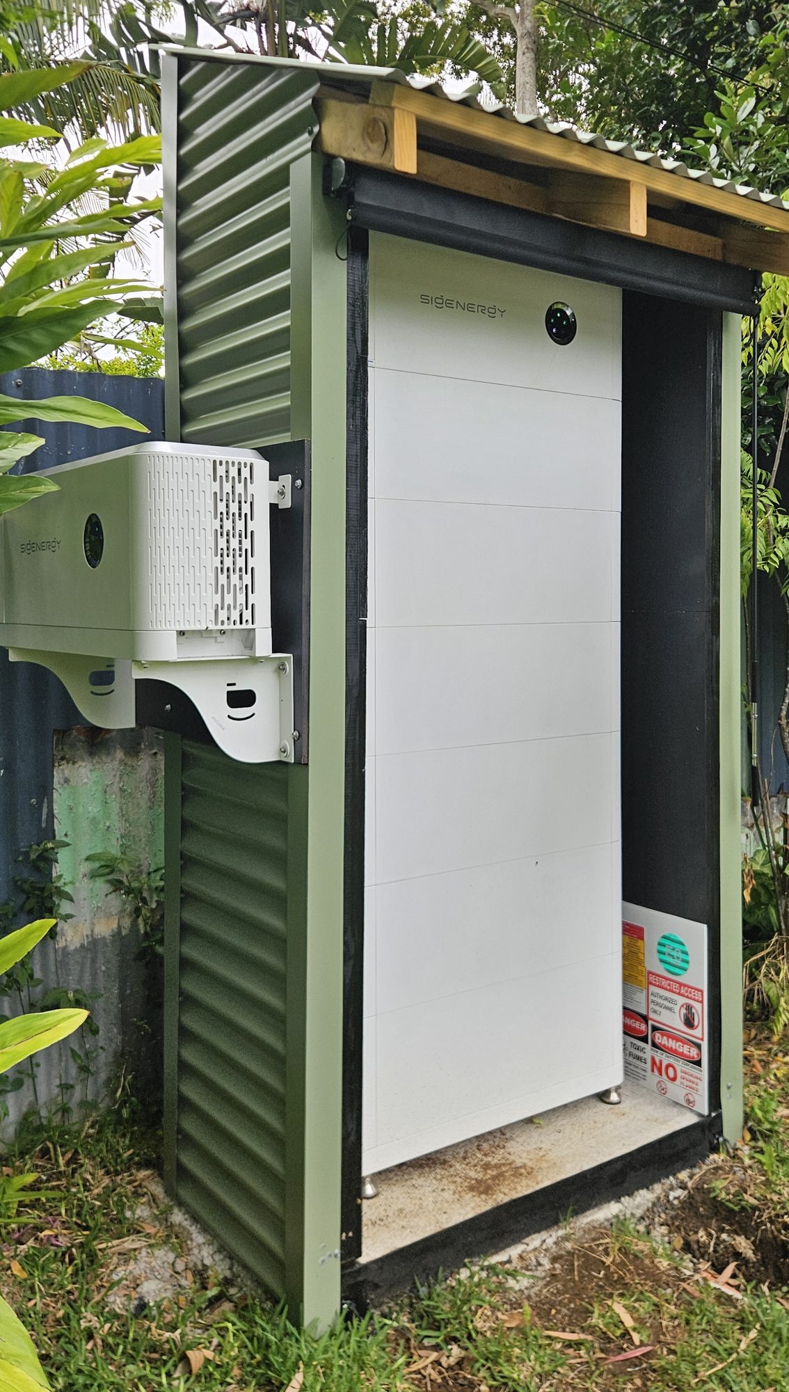Sigenergy SigenStor 54 kWh battery stack and hybrid inverter in a purpose-built Colorbond battery shed, Mullumbimby hinterland install by Sun Connect Solar