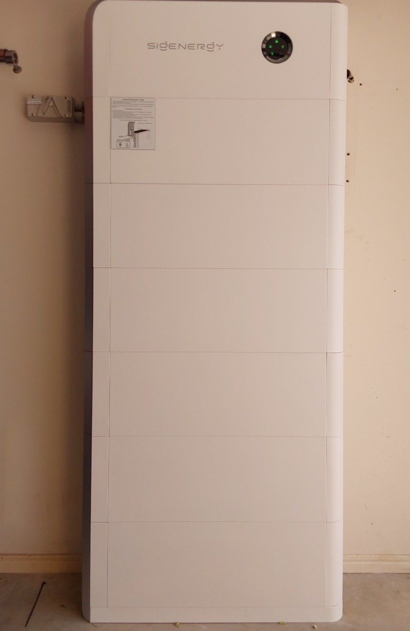 Tall Sigenergy SigenStor 48 kWh battery stack with six battery modules in a Tintenbar garage, installed by Sun Connect Solar